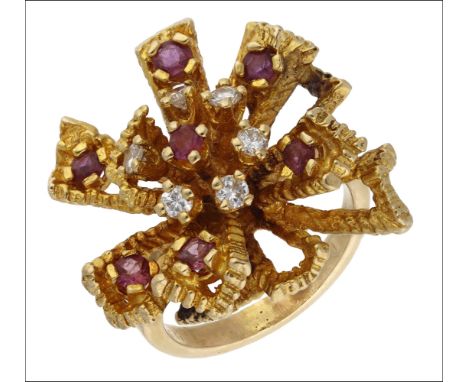 A ruby and diamond ring, circa 1970, the openwork cluster of textured radiating design, set with circular-cut rubies and bril