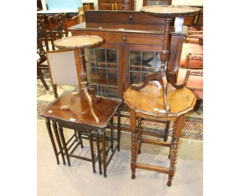 An oak display cabinet, the rectangular top above a pair of leaded-light doors, on turned supports united by stretchers, 90cm