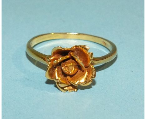 A gold rose ring marked 10ct, size P, 2.7g.