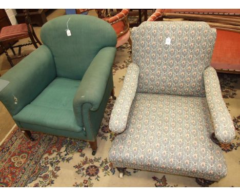 A Victorian deep-seated low salon chair, on short turned front legs with ceramic castors and an Edwardian upholstered arm cha
