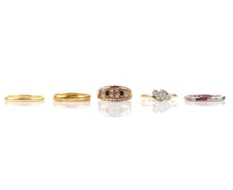 Five rings; one court band, in 22 ct, ring size N; another similar wedding band, 18 ct, ring size Q; three stone illusion-set