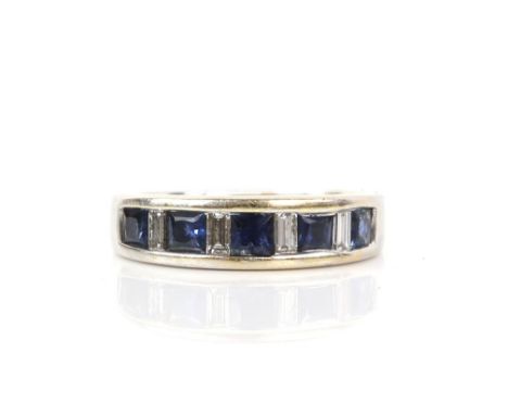 Sapphire and diamond band ring comprising five square step-cut sapphires alternated with four baguette cut diamonds, shank st