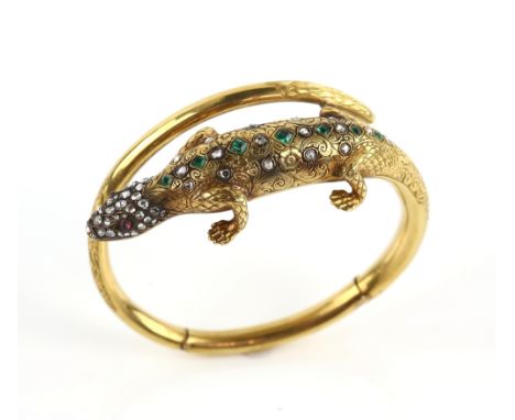 Victorian Lizard bangle, set with rose cut diamonds, square cut emeralds, and cabochon cut garnet set eyes, mounted in 18 ct,