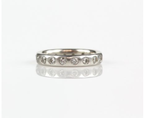 Modern diamond full eternity ring, eighteen round brilliant cut diamonds, weighing an estimated total of&nbsp;0.34 carat, rub