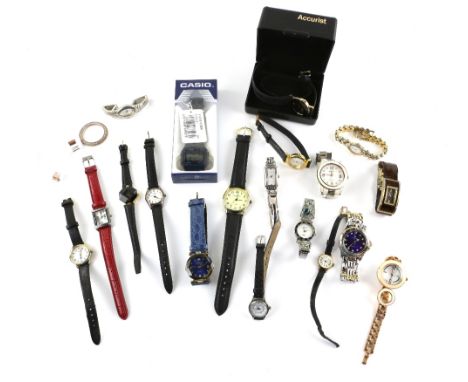 A group of Ladies and Gentleman's Quartz fashion wristwatches including a Pierre Cardin Gentleman's blue dial watch, a Casio 