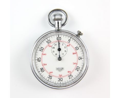 A Heuer 60 Second 30 minute stopwatch the white dial with black Arabic numerals and track, surmounting a subsidiary dial, ste