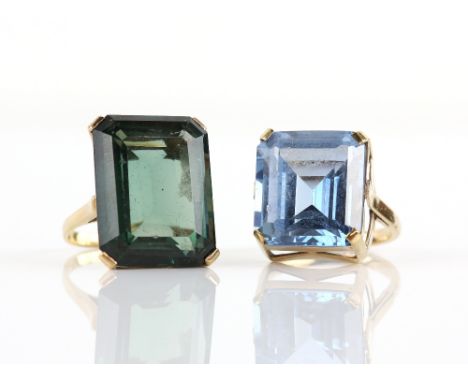 Two synthetic spinel rings, comprising an emerald-cut synthetic blue spinel, mount stamped 9 ct, ring size K and an emerald c