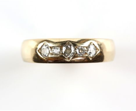 Austro-Hungarian five stone diamond ring, with old cut diamonds, weighing an estimated total of 0.35 carat, mounted in a wide