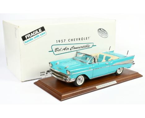 Danbury Mint 1/12th scale 1957 Chevrolet Bel Air Convertible - blue with white/blue interior, white folded hood and chrome tr