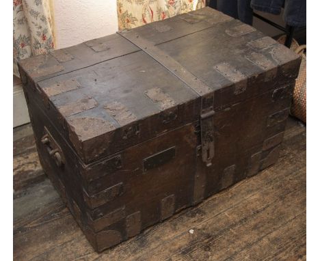 A George III oak and iron strengthened silver chest bearing the plaque of Captn Hoste R V, with long hinged hasp opening to r