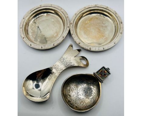 A pair of silver wine coasters, with celtic design, hallmarked Birmingham 1967 (gross weight for the pair approximately 121 g