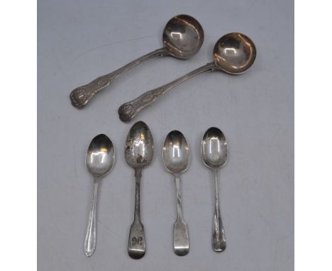 Two Kings pattern sauce ladles, each with dragon and coronet crest, one London 1848 by George and four silver teaspoons, appr