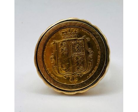 An 1872 half sovereign set in a 9ct gold signet ring. Gross weight approximately 10.5 grams. Size U. Please note condition of