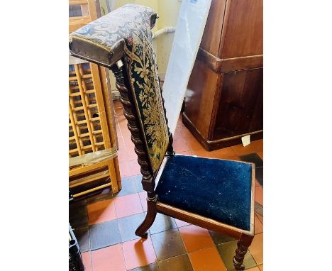 A Victorian mahogany Prieu Diue chair, circa 1860, T-shaped back rest with tapestry flanked twisted columns, velvets inlay re