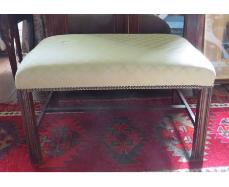 A large upholstered stool , made by&nbsp; Anthony Fortescue , mahogany frame and upholstered in a light sage green 46cm high 