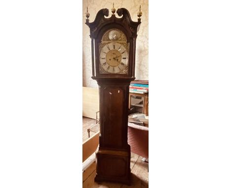 A George III oak crossbanded, ebonised and marquetry strung 8-day longcase clock by James Green, Nantwich, scrolling foliage 