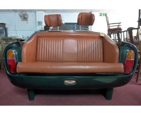 An Aston Martin DB6 sofa with label for Superleggera 