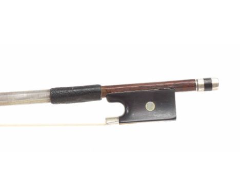 French silver mounted violin bow attributed to F.N. Voirin, the stick round, the ebony frog inlaid with pearl eyes (one missi