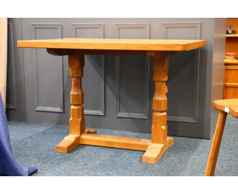 Robert Mouseman Thompson of Kilburn, an oak kitchen dining table with adze top, raised on trestle base, with mouse "signature