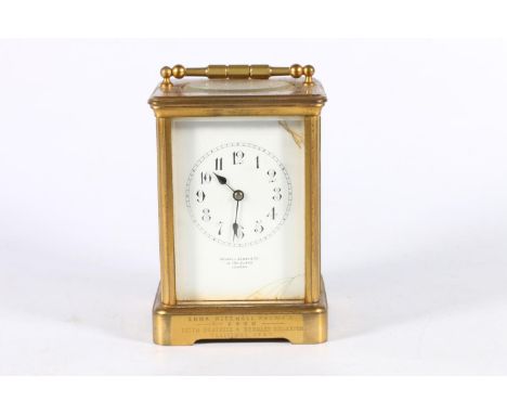 Howell James & Co of London, a French gilt brass carriage clock, the white enamel dial with Arabic numerals, lever escapement