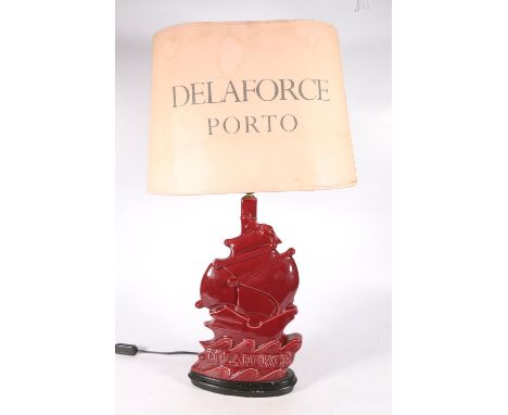 1920s advertising lamp and original shade for Delaforce Porto with stylised sailing ship, 73cm. Good overall condition. Wear 