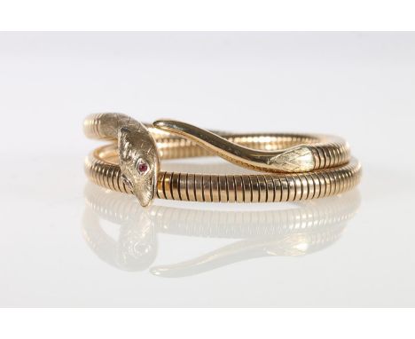 9ct gold 'slave' bangle in the form of an articulated snake with ruby set eyes by Smith &amp; Pepper Ltd, Chester 1959, 31g g