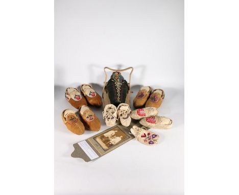 5 pairs of Native American moccasins, money pouch and papoose, along with photograph of John Gardner who was a Vicar in Ontar