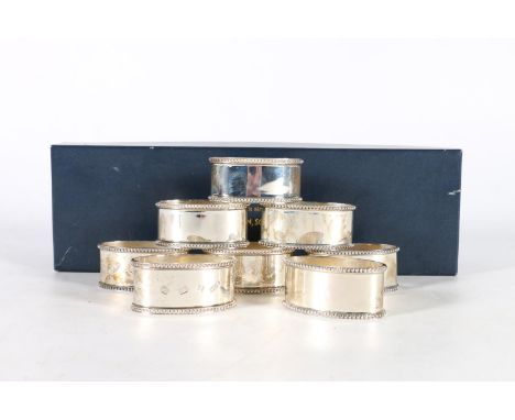Set of 8 silver napkin rings hallmarked for&nbsp;Laurence R Watson &amp; Co, Birmingham 1986, and retailed by Jamieson &amp; 