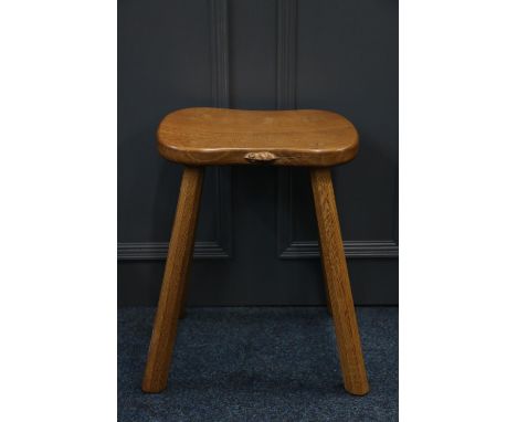 Robert Mouseman Thompson of Kilburn, an oak four-legged cow stool with shaped adze top seat, with mouse "signature" to the ed