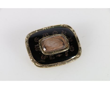 Georgian mourning brooch, with black enamel and hair within beveled glass frame, 4 x 3 cm. 