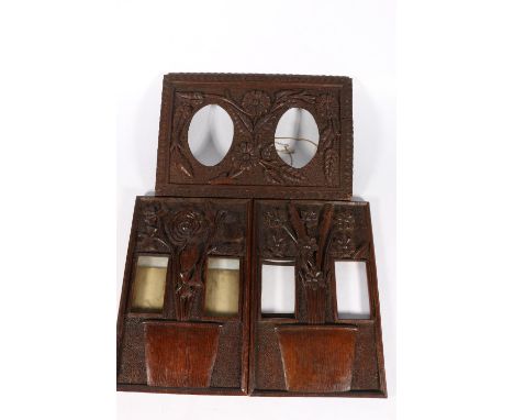 Two Scottish Art Nouveau stylised oak photograph panels depicting carved foliage within jardinieres, together with another pa