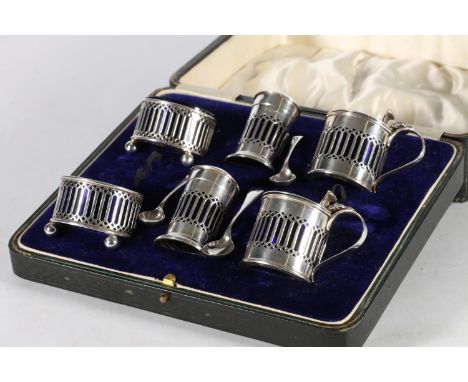 George V silver six-piece cruet set with pierced bands by Haseler &amp; Bill (E J Haseler &amp; C Bill), Chester 1920/1921, n