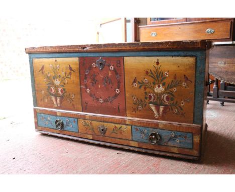 19th century Scandinavia or German painted trunk, with foliate and birds design and initials to front, the hinged top, long d