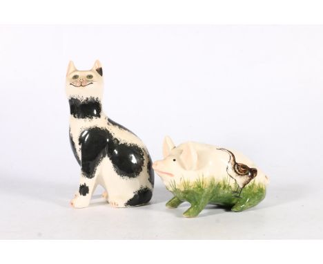 Griselda Hill Wemyss Pottery, a goose pattern model of a pig, signed to the underside, 16cm long, also a Galle style cat with