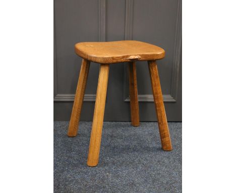 Robert Mouseman Thompson of Kilburn, an oak four-legged cow stool with shaped adze top seat, with mouse "signature" to the ed