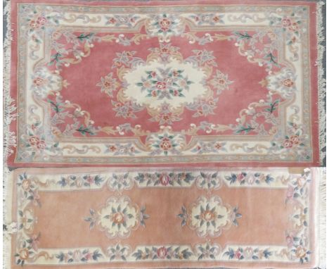 A pink and cream rug, approx 180x280cm and a salmon and cream runner, approx 70x250cm (2) 