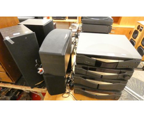 A Kenwood stacking music system with multi CD, amp (needs attention, not currently working), AV control center, cassette deck