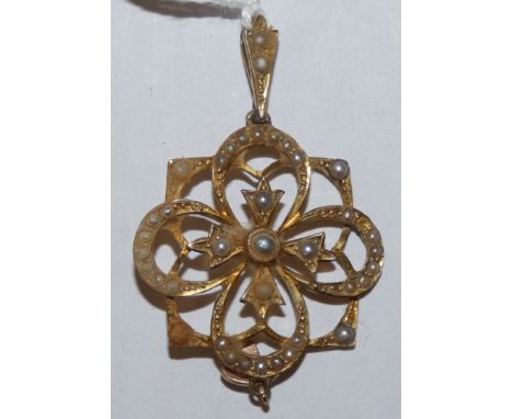 A Victorian gold and half pearl set openwork pendant 