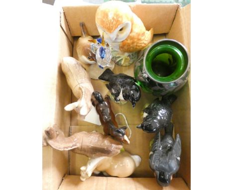 A collection of assorted ceramic figures, to include Beswick barn owl, various birds including Beswick 2274 Stonechat and a S