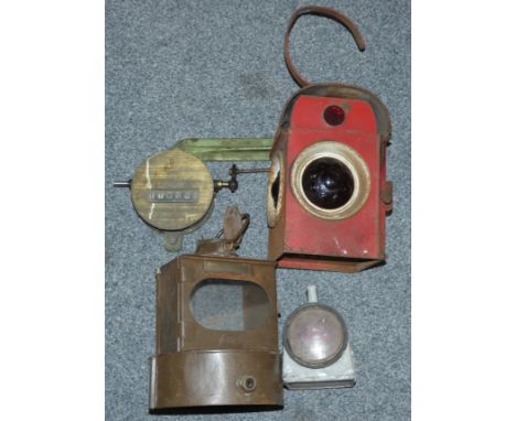 A BR(E) lamp internal, a WRCC red lamp and two other items 