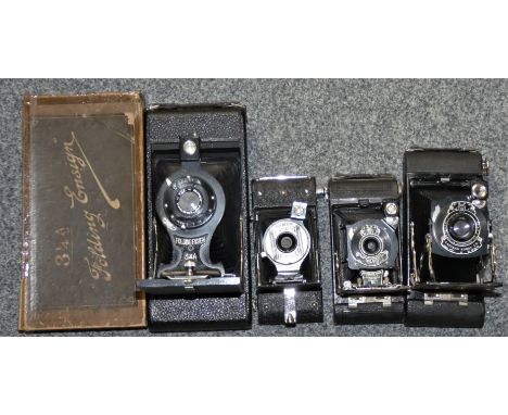 A Folding Ensign 3 1/4A camera, box, two folding Kodak cameras and two other cameras (untested)