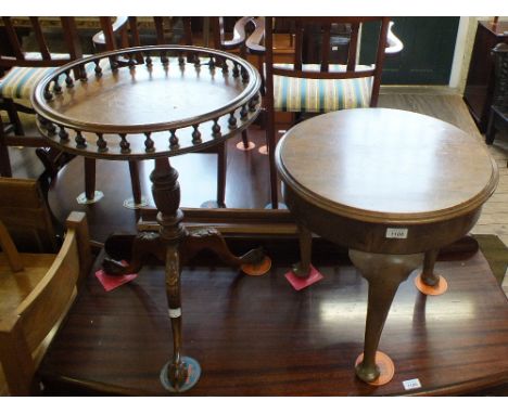 A walnut tripod table on carved cabriole legs and carved claw and ball feet and another occasional table