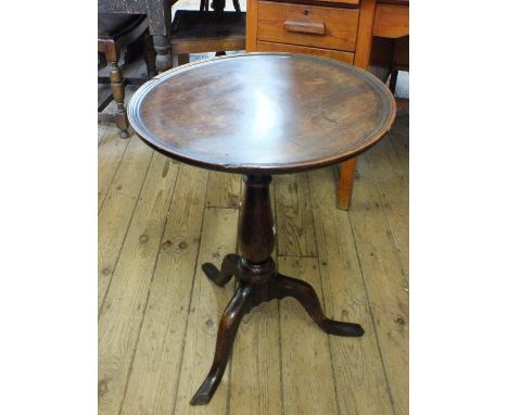 A 19th Century circular mahogany tripod table