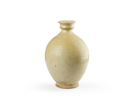 STRAW-GLAZED BOTTLE VASE TANG DYNASTY   唐 白釉盤口橄欖瓶 heavily potted with an oval body on a short flared foot surmounted by a gal