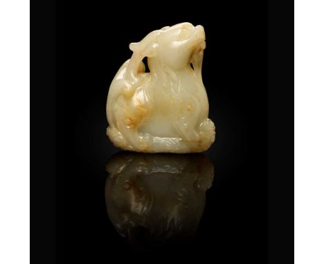 WHITE JADE CARVING OF A QILIN QING DYNASTY, 18TH-19TH CENTURY   清 白玉雕麒麟把件 the mythical animal in seated position above ruyi-h