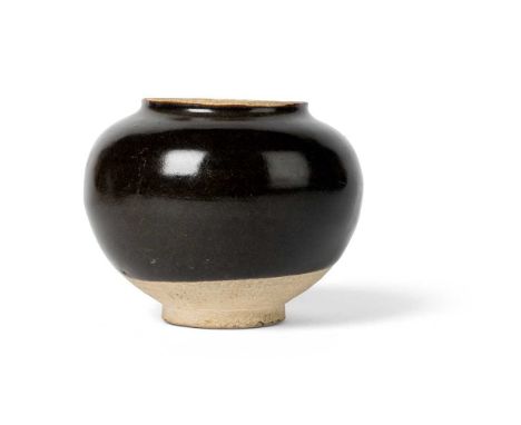 BLACK-GLAZED JAR NORTHERN SONG DYNASTY  北宋 黑釉罐 the globular body rested on a short foot rising to a slightly everted short mo
