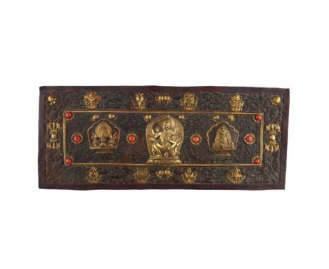 PARCEL-GILT COPPER-ALLOY REPOUSSÉ AND CORAL-INLAID PLAQUE OF ACALA WITH CONSORT VISHVAVAJRI TIBET, 18TH-19TH CENTURY   西藏 十八至