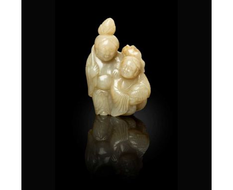 PALE CELADON JADE CARVING OF 'HEHE ERXIAN TWINS' FIGURAL GROUP MING DYNASTY, 17TH-18TH CENTURY   明 青白玉雕和合二仙把件 carved as the m