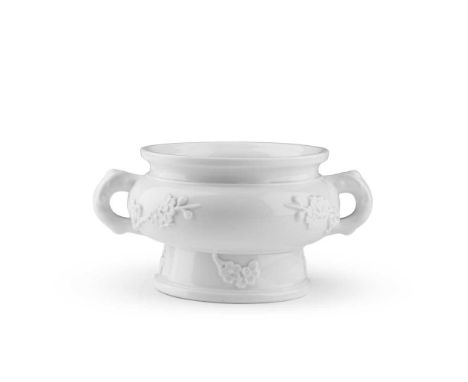 DEHUA CENSER  QING DYNASTY, KANGXI PERIOD   清康熙 德化白瓷梅紋簋式爐 of archaic gui form setting on a high everted foot, decorated with 