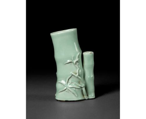 CELADON-GLAZED BAMBOO-FORM BRUSHPOT  QING DYNASTY, QIANLONG PERIOD   清乾隆 青釉節節高升竹節型花插 naturalistically modelled as a hollowed 